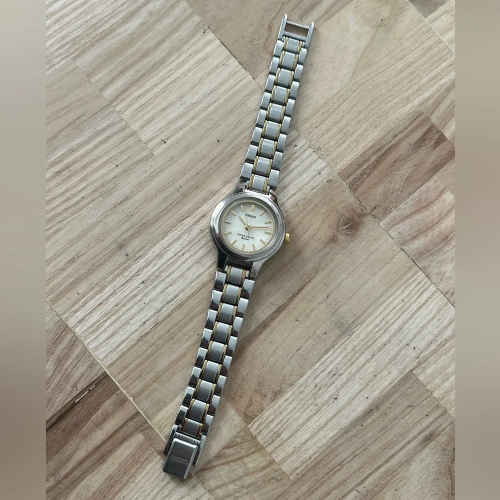 Seiko Ladies Watch Spiral Stainless Dial Gold-Tone Markers Two-Tone Bracelet